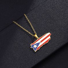 This pendant necklace features a map of Puerto Rico etched onto a delicate pendant. The pendant hangs from a dainty chain, making it the perfect accessory for those who love to travel or have a connection to a specific country. The intricate map design adds a unique touch to any outfit and is a meaningful way to show your pride for your heritage or favorite country. It is a perfect gift for travelers, expats, and anyone who wants to show off their love for a particular country. The pendant is ma Puerto Rico Map, Patriotic Jewelry, Pride Support, Puerto Rico Flag, Flag Outfit, Map Pendant, Country Wear, Map Necklace, Country Maps