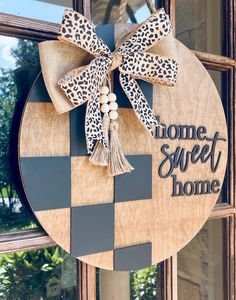 Our checkered door hanger will look perfect on your front door! They also make excellent gifts! These shiplap style door hangers are cut from real wood and measure approximately 18x18 inches. They feature laser-cut 3D letters and come with a sturdy decorative rope for hanging. Thank you so much for visiting our shop! Please message me with any questions! Door Hanger Displays, Board Wreaths For Front Door, Monthly Door Hanger, House Shaped Door Hanger, Ribbon Door Hanger, Checkered Door Hanger, Welcome Door Hanger Ideas, Door Hangers For Double Front Doors, Kentucky Door Hanger