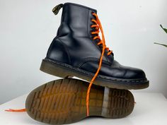 Very cool looking combo classic Y2K DR. Martens leather boots with typical brand yellow sewing by the soles and acid orange/black new lace pair. Oil, petrol, acid, Alkan, Fat resistant sole. Dated around early 2000's.. Tag: Dr.Martens Size: 38, UK5, US6 Condition: pre owned in very good vintage shape. Shipping worldwide! Always A+ priority with a tracking code. Order handling time 1-3 working days. Shipping via post 1-30 working days. If you have any questions - feel free to ask! Army Boots, Martens Boots, Dr Martens Boots, Boots High, Work Boots, Dr. Martens, Boot Shoes Women, Orange Black, Leather Boots