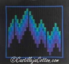 a black background with blue and green squares in the shape of mountains on top of each other