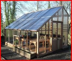 a small wooden house with a glass roof