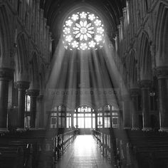 the light shines through the windows in an old cathedral