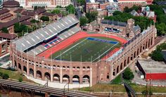 an aerial view of a football stadium in the city