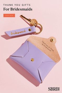 a purple purse with a keychain attached to it and the words thank you gifts for bridesmaids