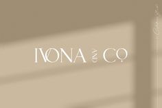 an image of the word irona and co written in white on a beige background