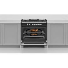 an oven with two burners and one door open in a white kitchen countertop