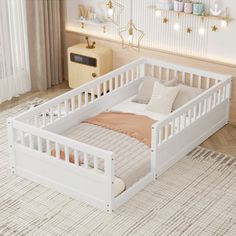 a white wooden bed frame in a room with beige carpeting and lights on the wall