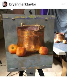 an oil painting of peaches in a copper pot on a table next to other items