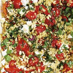 a square dish filled with tomatoes, corn and feta cheese topped with fresh herbs