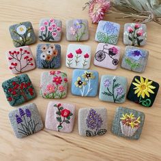 small embroidered coasters with flowers on them