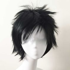 a white mannequin head with black hair