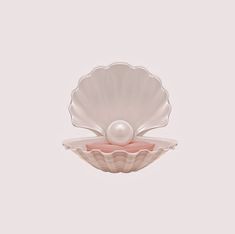 an empty shell with a pearl in it on a white background and a pink bottom