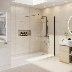 a bathroom with a sink, mirror and shower in it's center wall is shown