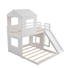 a white wooden bunk bed with a slide