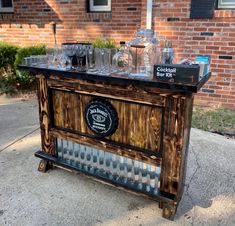 an old fashioned bar with glasses on top