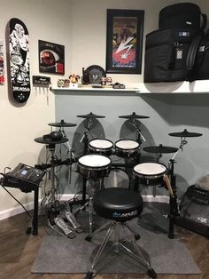 there is a drum set in the room