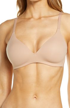 This seamless, wireless T-shirt bra disappears under clothing and features memory foam cups for a comfortable, contoured fit. Partially lined 55% nylon, 45% spandex Hand wash, dry flat Imported Lingerie Socks, Nude T Shirts, Shapewear Lingerie, Underwire Sports Bras, Sport Bikinis, Foam Cups, Free Tshirt, Shirt Bra, Women's Shapewear