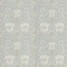 an old wallpaper with white flowers and leaves on blue background, suitable for use in interior or exterior design