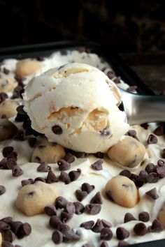 a scoop of ice cream with chocolate chips on top