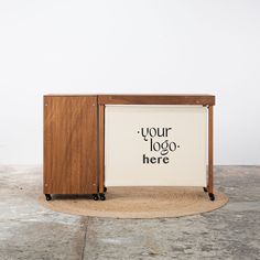 a wooden box with a sign that says your logo here