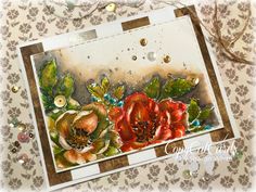 a close up of a card with flowers on it