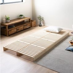 PRICES MAY VARY. [PRODUCT INFORMATION] Size of a Single pallet: 19.7 x 19.7 in (50 x 50 cm), Height: 3.9 in (10 cm) Material: Solid pine wood Components: 8 Wooden Pallets and 6 Connecting Parts [REMOVE HUMIDITY and KEEP YOUR MATTRESS DRY and CLEAN] People are said to sweat about 1-2 cups per night while they sleep and that is why the ventilation of bedding is so important. If you use it as a bed, the space between the slats helps the bedding be aired out properly. The ventilation of the bedding Floor Bed Cushion, Single Bed On Floor, Tarva Bed Frame, Japanese Floor Mattress Bedroom Ideas, Japanese Futon Bedroom, Japanese Floor Mattress Room, Modern Platform Bed Japanese Style, Japanese Platform Bed In Bog Rooms, Japanese Mattress