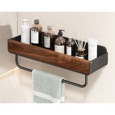 a bathroom shelf with soaps, lotions and other personal care items on it