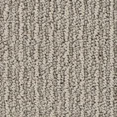 an up close shot of the texture of a carpet that is made out of grey and white