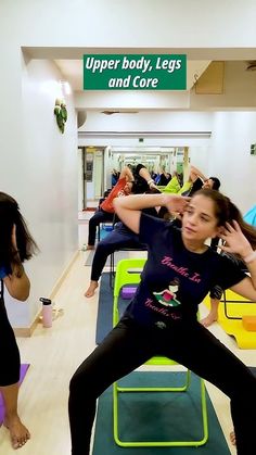 a group of people doing exercises in a gym