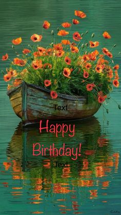 a boat filled with lots of flowers on top of a lake next to the words happy birthday