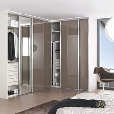 a bedroom with a bed and closets in it