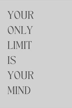 the words your only limit is your mind on a gray background with black and white lettering