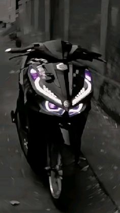 a motorcycle with an evil face painted on it