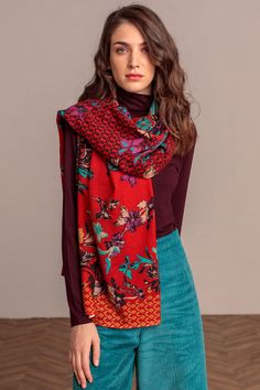 Made of extra fine merino wool, this gorgeous shawl celebrates the beautiful gardens of Serbia. The long length and light weight provides many styling options, and its deep red color adds a hint of elegance and luxury to your everyday wardrobe combinations. Contemporary, fun, elegant and regal in feel. 74 3/4" length x 23 1/2" width 100% Extra Fine Merino Wool Made in Serbia Ships from the USA Why we love this product? There are so many ways you can style this shawl to work for your fashion need Red Winter Scarf, Ivko Woman, Red Scarf Winter, Reversible Scarf, Beautiful Color Combinations, Wool Shawl, Long Scarf, Botanical Garden, Wool Scarf