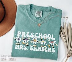 100 Days of School Prek Teacher Shirts, Custom Preschool Teacher Daisy Shirt, 100th Day Pre K Teacher Tee, Boho Pre-K Teacher Floral Shirt HOW TO ORDER ➀ Select color ➁ Select the size (Please check size chart) ✦ True to size. Size up 1-2 sizes for an oversized look. ➂ Add to cart ✦ (Optional) "Add message to Seller" on the checkout page. GARMENT FEATURES ✦ Crew neckline ✦ Direct to garment printing - no vinyl, decal, or iron-on technique ✦ Our designs are printed on the garment to last a long time and may not appear as 'glossy' or saturated as iron-on designs are. ✦ Please note that colors may appear different on different digital screens and may not be a true representation of the actual colors. ✦ Additional T-Shirt Colors and Sizes Available Upon Request ✧✧Brands: Bella Canvas Unisex 30 100 Days Of School Prek, Prek Teacher Shirts, Daisy Shirt, Prek Teacher, Pre K Teacher, Oversized Look, Teacher Tees, Long T, Preschool Teacher