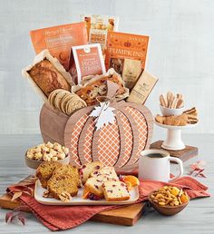 a basket filled with lots of different types of food and snacks on top of a table