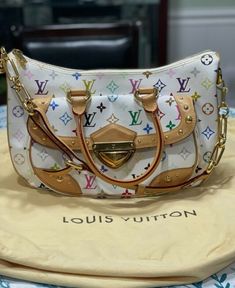 AUTHENTIC LOUIS VUITTON RITA WHITE MULTI COLOR MONOGRAM LV Lightly used..only wore about 7 night outs, very little wear. Nike Fashion Shoes, Lv Monogram, Nike Fashion, Authentic Louis Vuitton, Fashion Shoes, Night Out, Multi Color, Louis Vuitton, Monogram