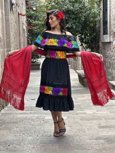 This Beautiful Off the Shoulder Mexican Dress has lace details throughout the dress.  It's comfortable with elastic around the shoulder and waist and it's made out of cotton. The flowers are embroidered by Mexican Artisans on an artisanal Machine.  Please note: You have the option of purchasing the dress with one of the two belt options shown for a special price or purchasing the dress on its own. More dresses available here: https://www.etsy.com/es/shop/SoleiEthnic?ref=seller-platform-mcnav&section_id=25367133 Multicolor Embroidered Cotton Dress, Mexican Traditional Dress, Mexican Fiesta Dresses, Traditional Mexican Dress, Fiesta Dress, Mexican Dress, Mexican Girl, Mexican Dresses, Floral Embroidered Dress