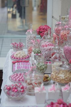 a table topped with lots of candy and candies