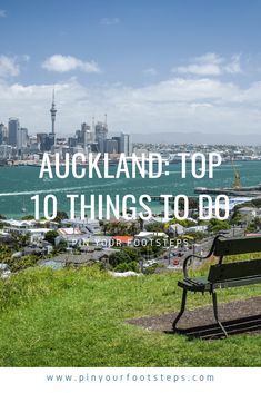 a park bench with the city in the background and text overlay that reads, auckland top 10 things to do