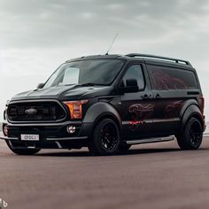 a black van with red flames painted on it