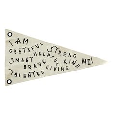 a white pennant with words written on it