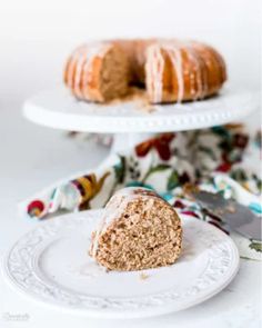 a bundt cake sitting on top of a white plate next to another bundt cake