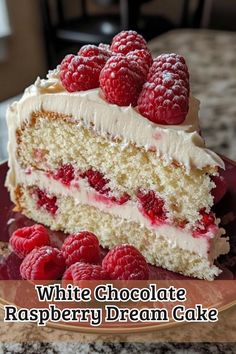 a white chocolate raspberry dream cake on a plate