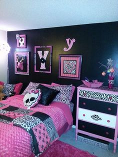 a bedroom decorated in pink, black and white