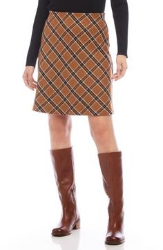 A neat plaid print lends eye-catching charm to this skirt that's made to complement your polished style. 20 1/2" length (size Medium) Pull-on style Lined 42% polyester, 28% acrylic, 25% cotton, 5% viscose Dry clean Made in the USA of imported fabric Bias Cut Skirt, Karen Kane, Plaid Skirt, Plaid Skirts, Plaid Print, Daily Look, Staple Pieces, Fall Season, Made In The Usa