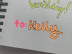 a spiral notebook with the words, happy birthday to kely written in orange and green