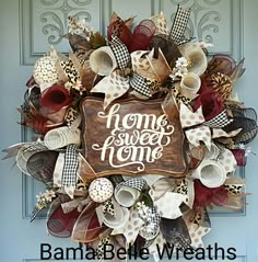 a wreath that says home sweet home on it