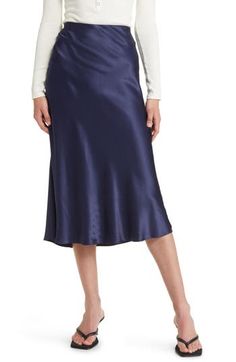 Put some slink in your step in this solid satin midi skirt fitted with a concealed elastic waistband to help you move through your day with ease. 55% rayon, 45% viscose Dry clean Imported Elegant Navy Midi Skirt, Dark Blue Satin Skirt, Navy Satin Midi Skirt, Satin Skirt Brown, Navy Flowy Midi Skirt, Luxury Satin Midi Skirt, Satin Long Skirt, Skirt Ootd, Plum Velvet