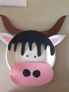 a paper plate with a cow's head on it